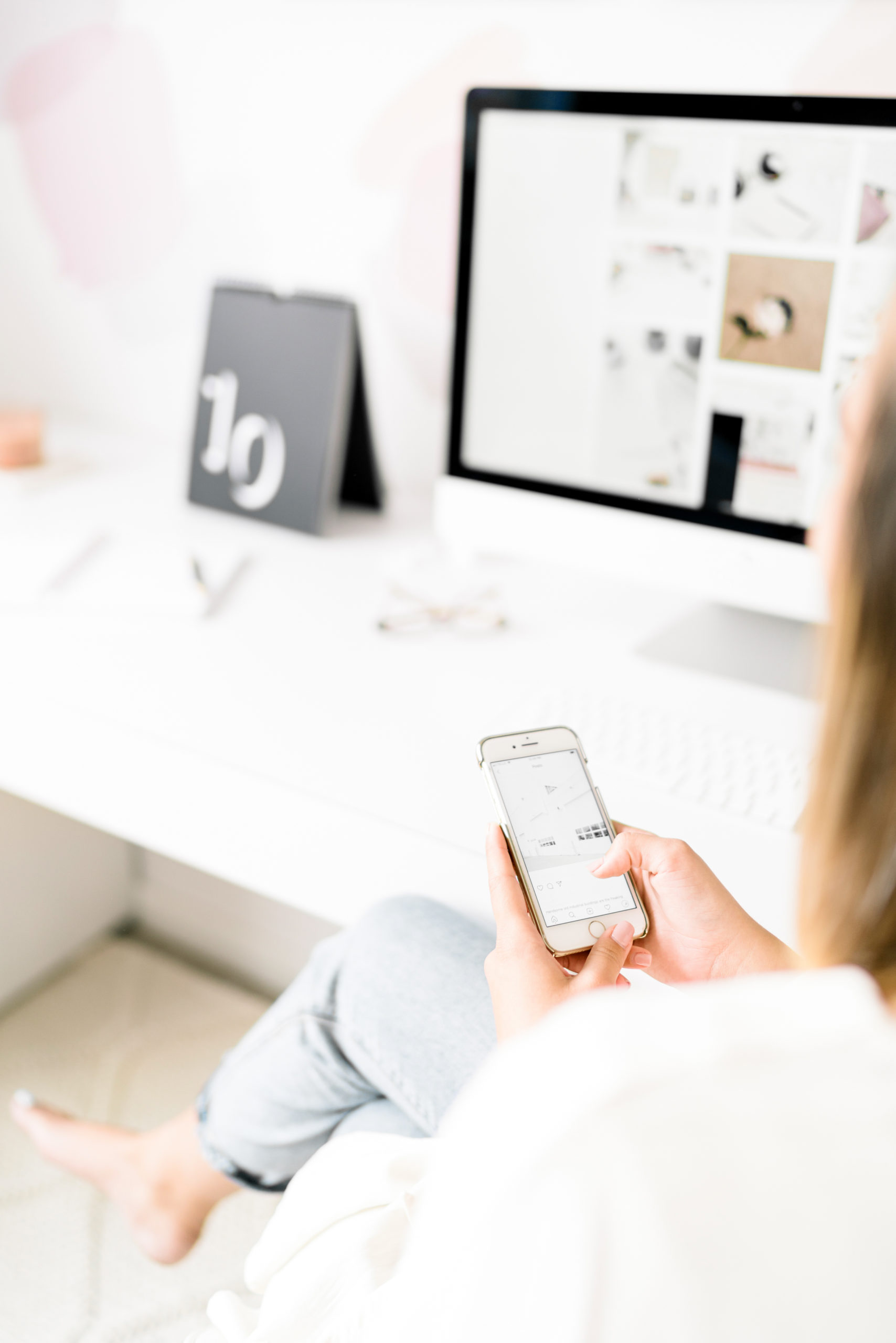 business owner sitting at desk waiting on contractor to send a contract
